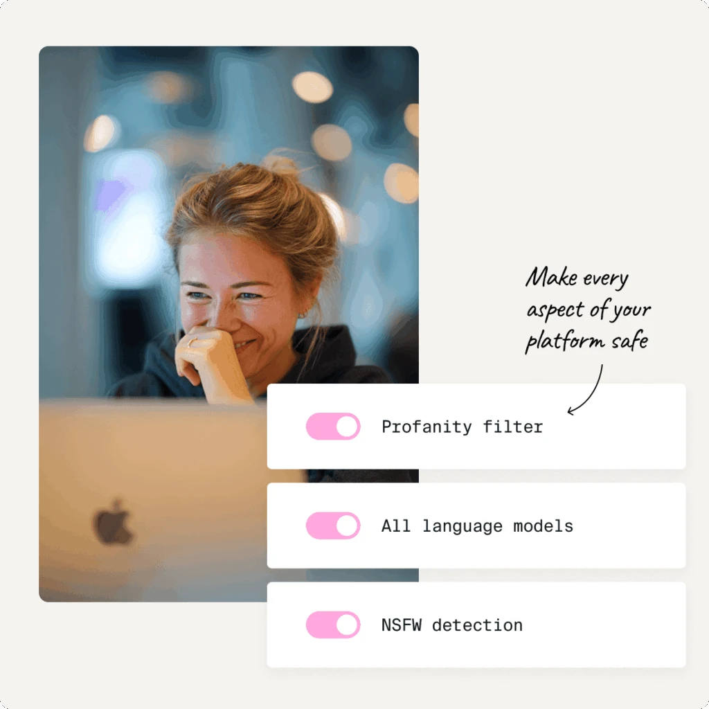 Photo of a woman behind a laptop